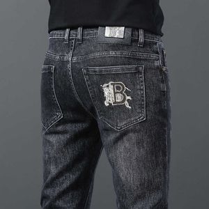 Mäns jeans designer europeisk höst och vinter nya jeans, mäns smal pass