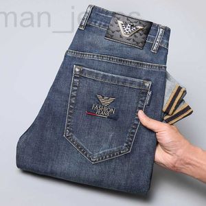 Projektant dżinsów męskich cienki lato Slim Fit proste długie spodnie moda europejska ZB7C
