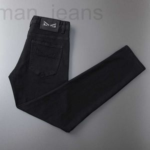 Designer de jeans masculino primavera e outono Xintang novo preto para homens ajuste fino pés pequenos elástico marca de moda européia calças compridas casuais 3DE9