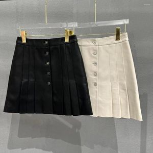 スカート黒い傘スカート本物のレザーハイウエストシングル胸肉女性のためのミニプリーツ