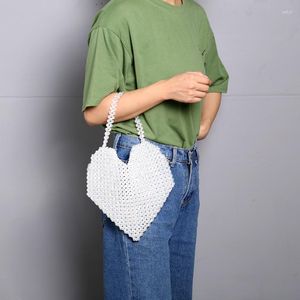 イブニングバッグユニークなハートデザインレディースパーティーバッグトップハンドルブリング電話財布とハンドバッグ手作りビードセレブ