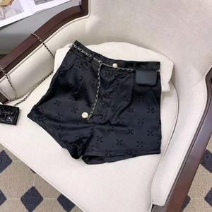 Summer Designer Women Sports Shorts Hot Pants Ice Silk Tkanina cienkie, niskie czarne szorty z guzikami