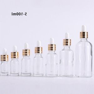 Flacons compte-gouttes en verre transparent de 5 ml à 100 ml flacon de sérum de luxe avec le plus récent bouchon en or pour huile essentielle Djlcm