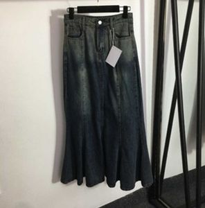 Kvinnor mode denim kjol blå ny stil ruffle hemfickor hög midja mager denim halva kjolar kvinnor designer casual mångsidiga kläder 55