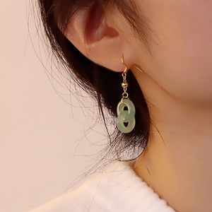 Dangle & Chandelier Hetian jade ring buckle earrings Classical temperament Xiu Wo bride earrings Gold plated double ring white jade peace buckle earrings