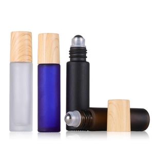 Rotolo di vetro smerigliato vuoto su bottiglia da 10 ml con contenitori di oli essenziali in plastica per grani di legno con tappo in metallo Kfwmd