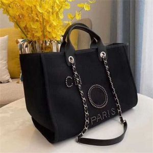 Saco de praia de lona de mão feminino de luxo bolsas clássicas mochilas grandes com capacidade para pequenos pacotes de corrente grande tiracolo Q821 YIPX 50% liquidação