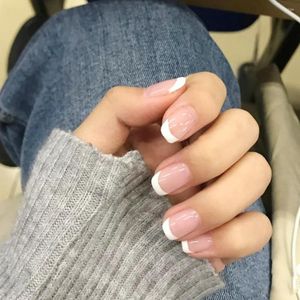 Falska naglar 24st kort rosa franska vita sida konstgjorda tips enkel nagel skönhet press på falskt fullt omslag med lim