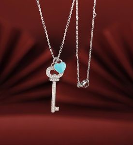 2023 прекрасный милый кулон ожерелья длинная серебряная тонкая цепочка из нержавеющей стали голубое сердце алмазный кристалл ключ дизайн женское ожерелье с мешком для пыли и коробкой