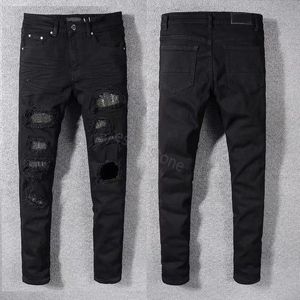 Schwarze zerrissene Jeans Miri Jeans Herren Designer Knie Skinny Straight Größe 28-40 Motorrad Trendy Long Hole High Street Denim Bin gestapelt