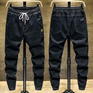 Mens jeans na moda homens cintura elástica primavera outono carga laceup tornozelo amarrado harem calças 230629