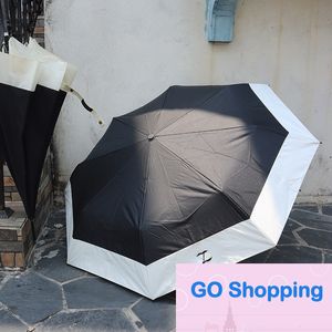 Hepburn Style Black and White Dual-Color Patchwork Personalized Sunshade Vinyl Sun Protective Folding Umbrella Big Umbrella