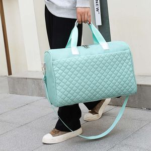 Nova bolsa de viagem feminina portátil de grande capacidade bolsa Fiess bolsa de treinamento esportivo bolsa masculina de ombro único oblíqua bolsa longa