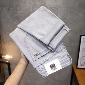 Men's Jeans designer Spring/Summer Korean Edition Small Foot Elastic Slim Fit European Brand Grey White Pants B Home U2KT