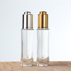 30 ml silver eller gyllene eterisk oljeflaska med UV -plastlock, 30 ml glaspress droppflaska för kosmetisk
