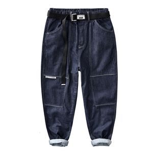 Jeans masculino 2023 primavera outono inverno masculino retrô todos os jogos cor sólida ferramenta solta bolso grande calça casual azul workwear 230629