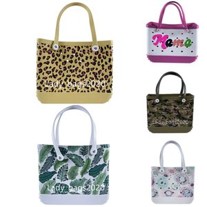 Kvinnors designer Eva Bogg Bag Leopard Doodle Beach Bags Luxury Designer Summer Hole Tote Stor Shopping Plastic Basket Beach Silicone Bog Purse Jelly Candy