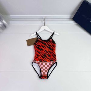 Girls' Designer One-Piece Swimsuit - Patchwork Print, Cross-Back Design, Chequered Detail
