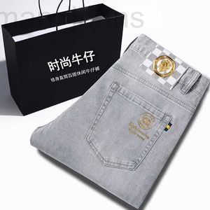 Męski projektant dżinsów Hongkong marka mody Summer Thin Grey High End Wszechstronny, swobodny elastyczny Slim Fit Małe proste spodnie GZQV