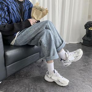 Pantaloni jeans da uomo con cerniera elasticizzata gamba dritta streetwear pantaloni in denim vestibilità ampia