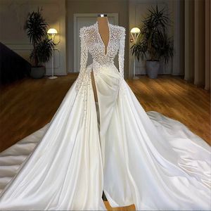 Beaded Heavy Pearls Dress Mermaid Illusion V Neck Long Sleeve Brudklänningar svep Train Muslim Dubai Wedding Gown High Couture