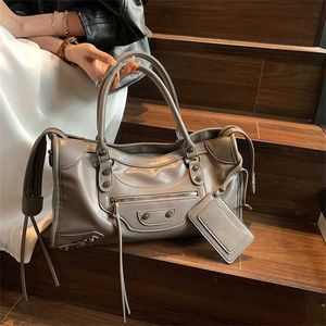 Heavy Industry Locomotive Women's 2023 New Trend Handbag Large Capacity Riveted One Shoulder Crossbody Bag model 2765