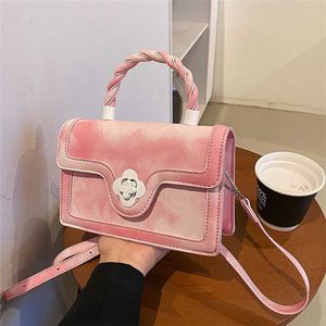 This year's popular Fried Dough Twists minority handbag new fashion summer senior texture small square messenger bag women model 7569