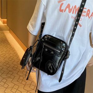 Rivet Locomotive 2023 New niche design Camera Textured Oil Wax Leather Crossbody Women's Bag model 9236