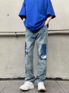 Mäns jeans rippade för män street smala blå pantalones hombre streetwear mode denim pantsfit blossing byxor svart