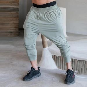 Męskie spodnie Joggers Mężczyźni bieganie w dresie Szybkie suche tropy siłowni fitness Sport Species Męskie letnie cienkie dno treningowe