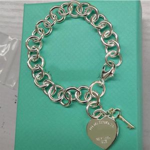 Оригинальные женские серебряные серьги S925, классические бирки с сердечками, ключи и логотипы, О-образные серебряные мужские ювелирные изделия, пара, праздничный подарок301J