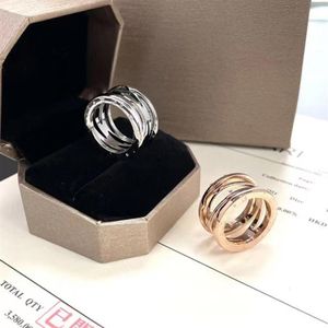 Lyxdesigner OpenWork Spring Ring B Bbredd Parringar Luxurys smycken Högkvalitativ fingerringar Enkla två modeller223q