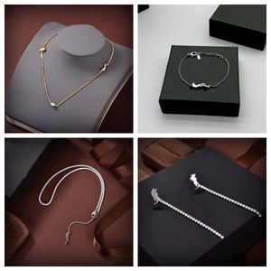 Ny mode toppsäljande designer hänge halsband pläterade armband pappersklipp/trottoarkant/figaro kedja justerbar för kvinnor 2024