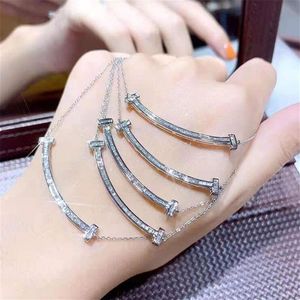 Nuovo arrivo nuovissimi gioielli di lusso reale argento sterling 925 taglio principessa topazio bianco pietre preziose diamante CZ sorriso viso clavicola Ne303S