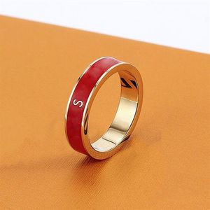 Modedesigners bandringar för pekfingerguld bokstav älskar kvinnor män ring bague lyxiga märken med låda hög kvalitet 210414031817