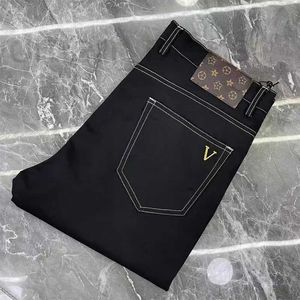 Tute da uomo firmate Pantaloni da completo europei di fascia alta, tendenza autunnale da uomo, rapporto dimagrante con gamba aperta elastica nera, pantaloni casual da lavoro 7FQ3