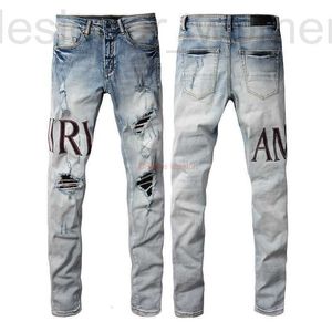 Мужские джинсы Дизайнерская одежда Amires Джинсовые брюки Amies New 1301 Fashion High Street Hole Patch Letter Mens Slim Fit Feet Distressed Ripped Skinny P1JP