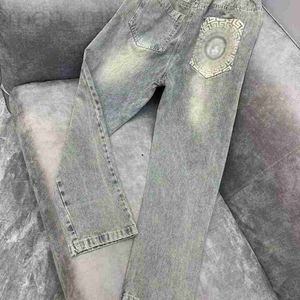 Jeans masculinos designer elegante e elegante rosto em relevo para homens 2023 verão novo coreano cintura alta magro colheita calças de perna reta tendência 819a