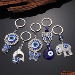 Nyckelringar Owl Dolphin Flower Elaphant Form Evil Eye Keychain for Women Men Blue Charms Pendant Bag biltillbehör Drop Deli Dhgarden Dhpj0