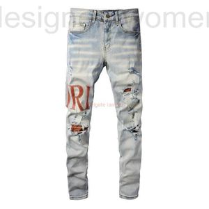 Jeans masculinos designer roupas amires denim o novo 840 letras de marca de moda soletrar buracos de couro slim fit pés pequenos luz cor lavagem homens velhos 844 fw8z