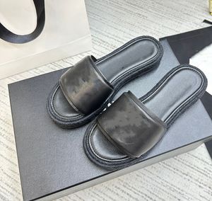 Pantofole intrecciate in spago di design di lusso, sandali da donna in rilievo piatto tinta unita