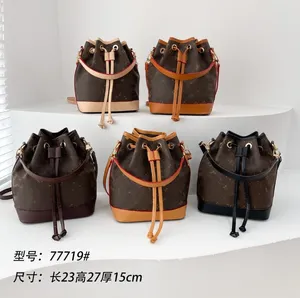2023 NYA PU Material Bucket Bag High Sense Pull-Belt Small Påsar Stitching Mini Bag One-Shulder Crossboby Påsar