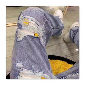 Fashin designer mens jeans with blue holes smiling face pattern pants trendy men designer jeans sports versatile casual slim long pants autumn