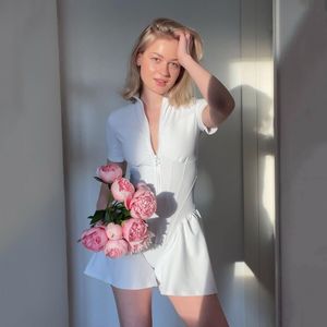 Avrupa ve Amerika Birleşik Devletleri Sıcak Sıcak Sıkı Etek Onesie Sonbahar Yeni Kadın Yuvarlak Boyun Kısa Kollu Fermuar Alt Gömlek
