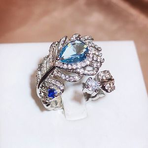 2023 Choucong Marke handgemachte Eheringe Luxusschmuck 925 Sterling Silber füllen blau 5A Kubikzircon CZ Diamant Party Frauen Versprechen offene Feder Ring Geschenk