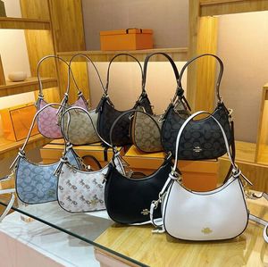 Bolsa feminina designer clássico nova bolsa feminina portátil carta impressa bolsa de ombro único crescente bolsa nas axilas