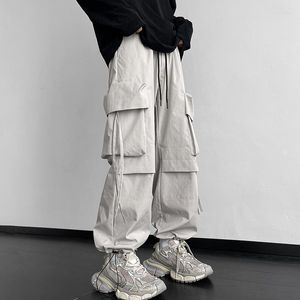 Calças masculinas homens fita de carga hip hop jogging masculino casual streetwear harem calças bolsos cintura elástica mulher sweatpants