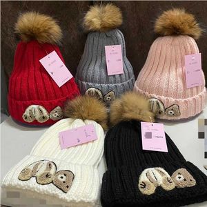 Höst- och vinter stickad hatt kvinnors koreanska mode ull hatt tvättbjörn hund hår boll räv hår kall hatt pullover förtjockade varma hatt män