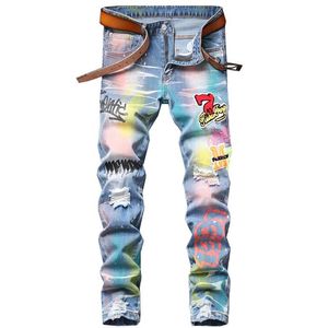 Splattered bläck färgglada tryck rippade lappa mäns jeans små raka smala mikroelastiska trendiga byxor för manliga pantalons p293t