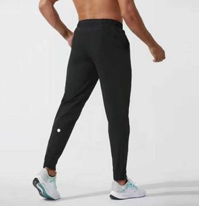 2024 lululemenI Mulheres Calças Curtas Yoga Outfit Jogger Esporte Quick Dry Cordão Ginásio Bolsos Sweatpant Calças Mens Casual Cintura Elástica Fiess gike886